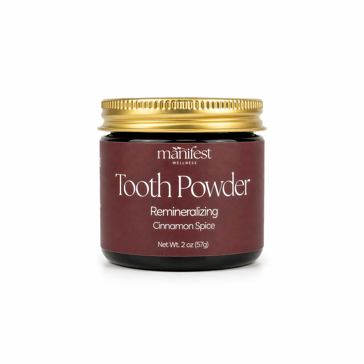 Jar of Manifest Wellness Cinnamon Spice Tooth Powder with a gold lid on a white background
