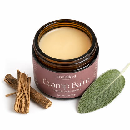Jar of Manifest Wellness Cramp Balm with cramp bark and sage herbs on a white background