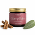 Jar of Manifest Wellness Cramp Balm with cramp bark and a sage leaf on a white background