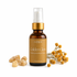 Manfrest Wellness Golden Glow Frankincense Resin Serum amber bottle with gold lid with frankincense resin and helichrysum flowers on a white background