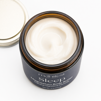 Jar of Manifest Wellness Sleep magnesium body butter opened on a white background