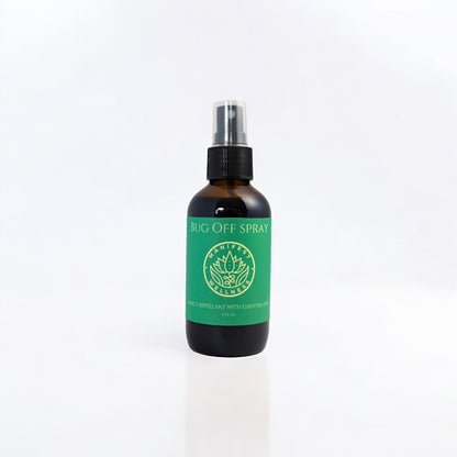 Bug spray glass bottle with green label on a white background